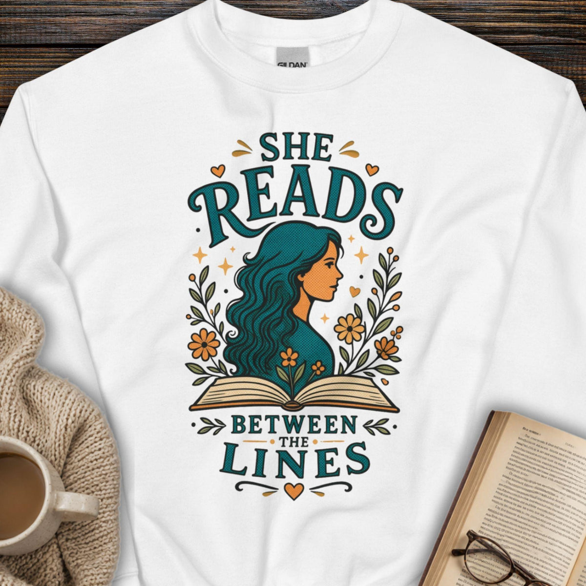 She Reads Between The Lines Sweatshirt