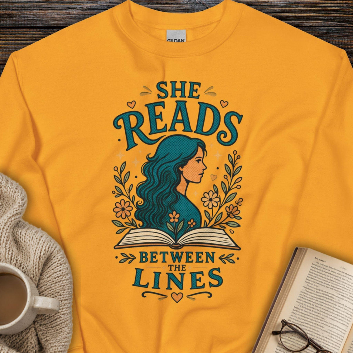 She Reads Between The Lines Sweatshirt