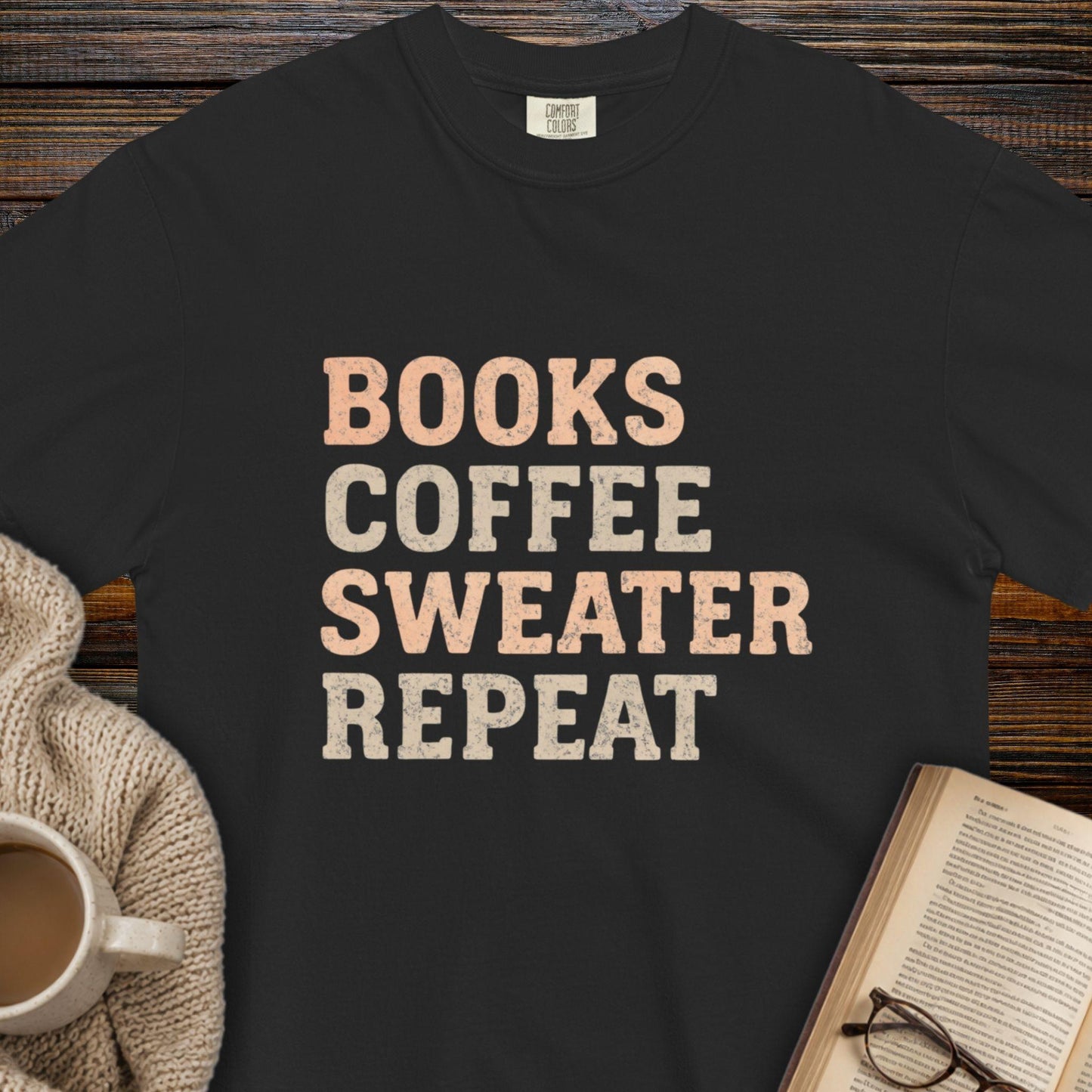 Books, coffee, sweater, repeat T-shirt